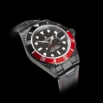 Black and red rolex watch