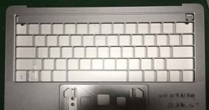 New apple macbook pro with oled touchpad revealed in leaked photos