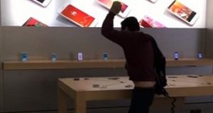Angry apple customer goes bananas in store destroys iphones with steel ball