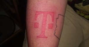 Apple fanboy gets gigantic t mobile tattoo on his arm for free iphone 8